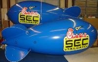 Advertising blimp with the Chick-fil-A logo at a bowl game